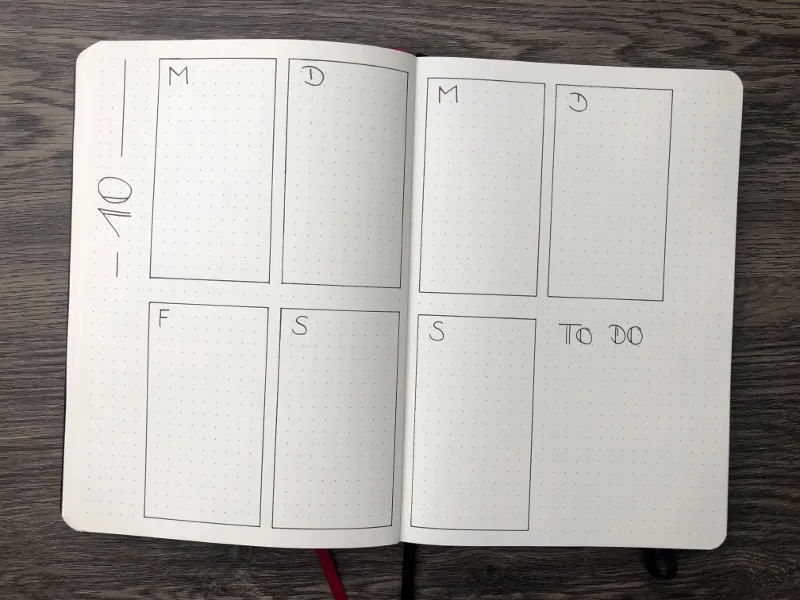 Minimalistische Wochenübersicht als Raster aus Kästchen für die Wochentage mit einem To-do-Feld