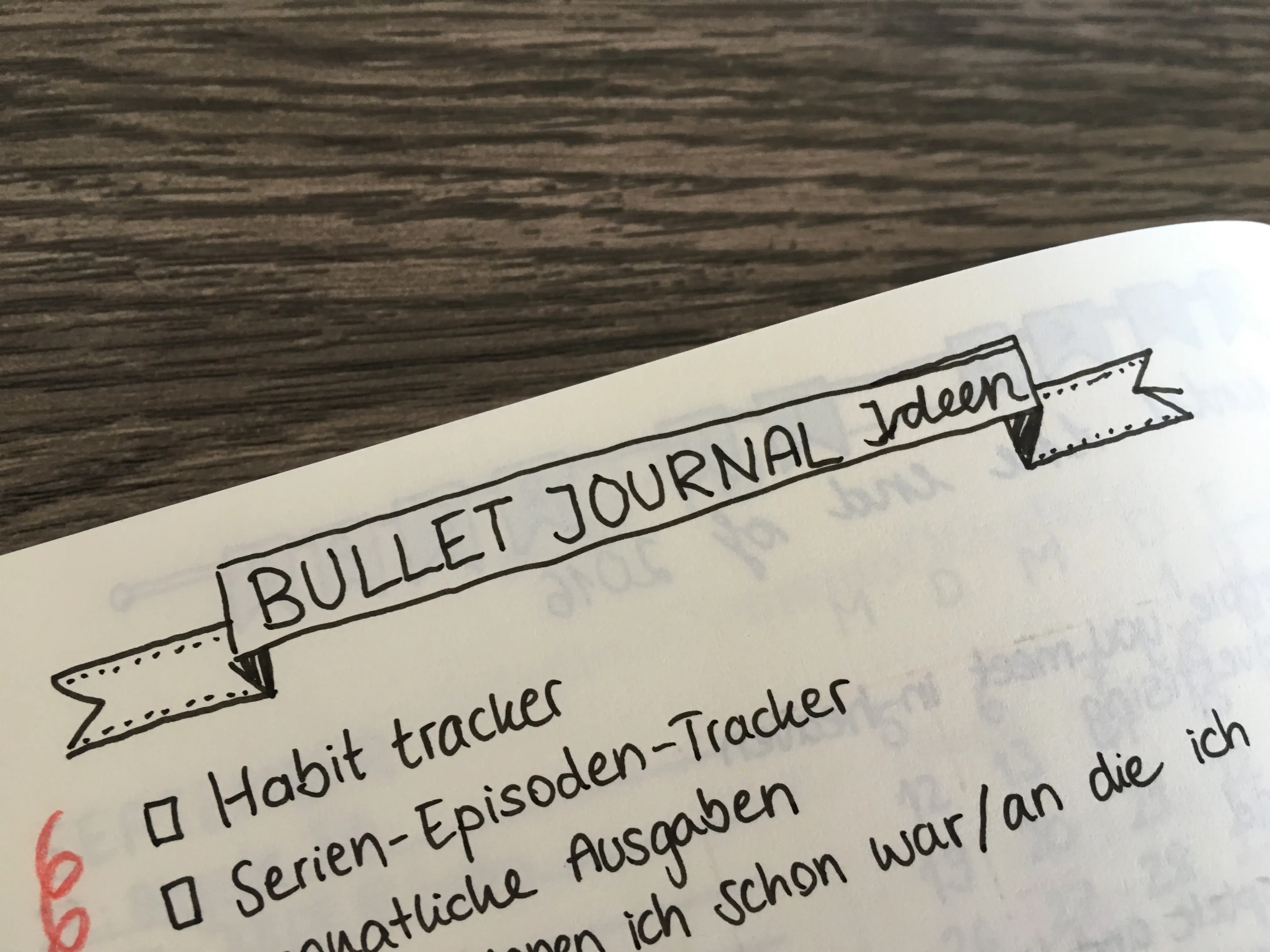 Handgeschriebenes Banner Bullet Journal Ideen mit Liste aus Habit-Tracker und Serien-Tracker